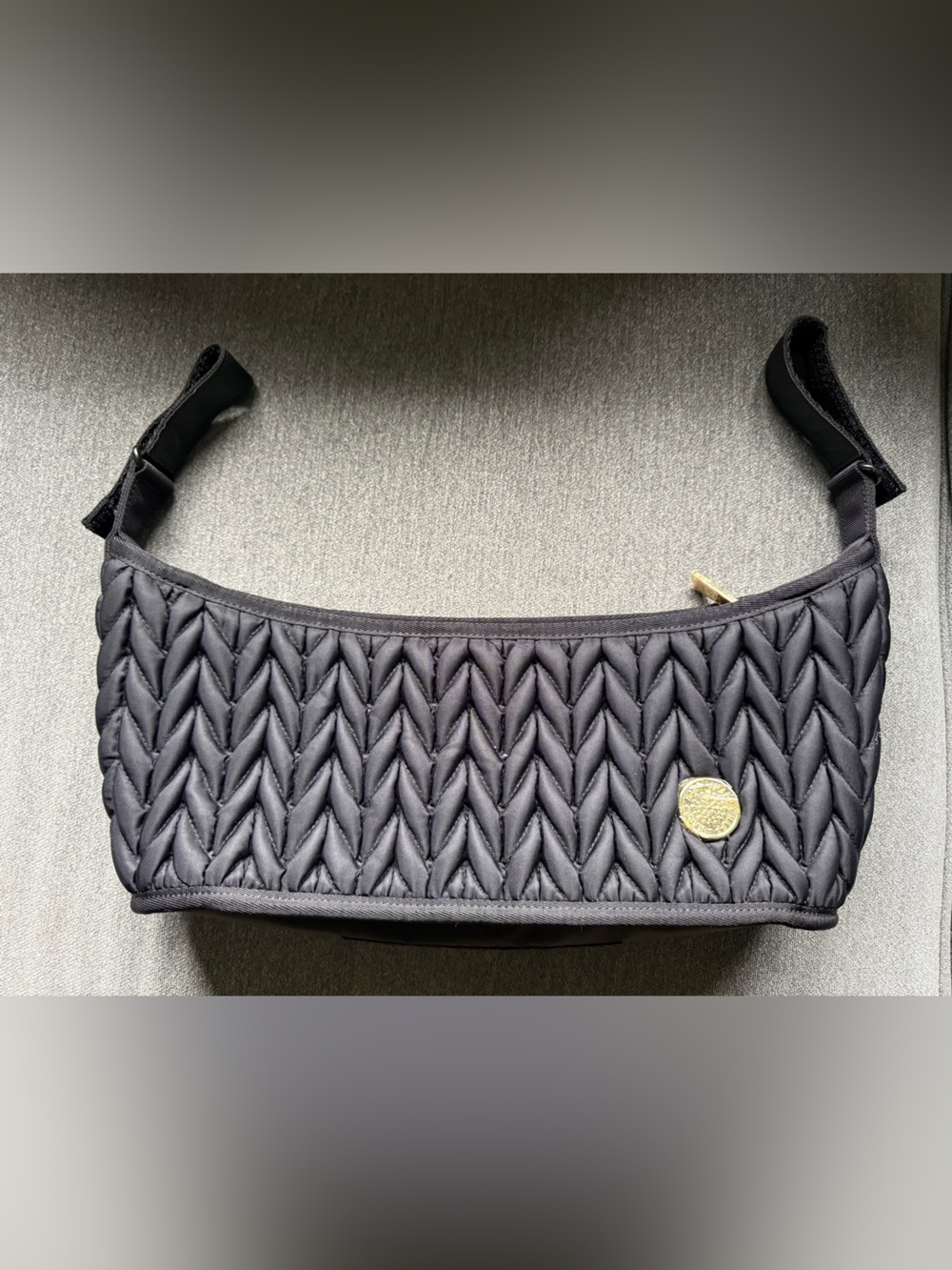 Black Quilted Shoulder Bag with Gold Emblem